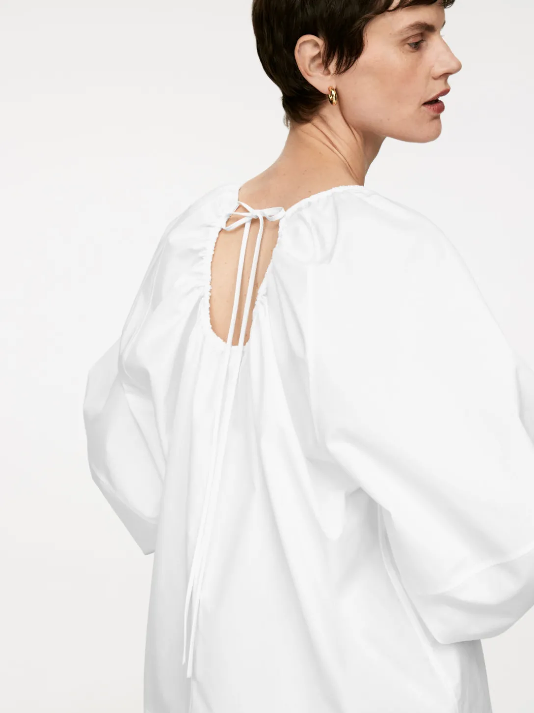 Blus Med öppen Rygg