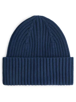 Ribbstickad Mössa